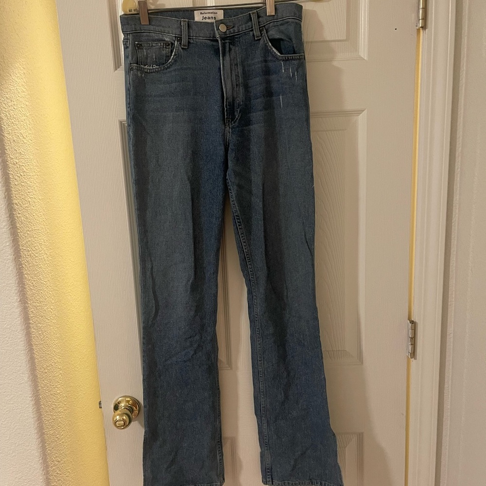Reformation straight leg/boot cut slit jeans in size 28.